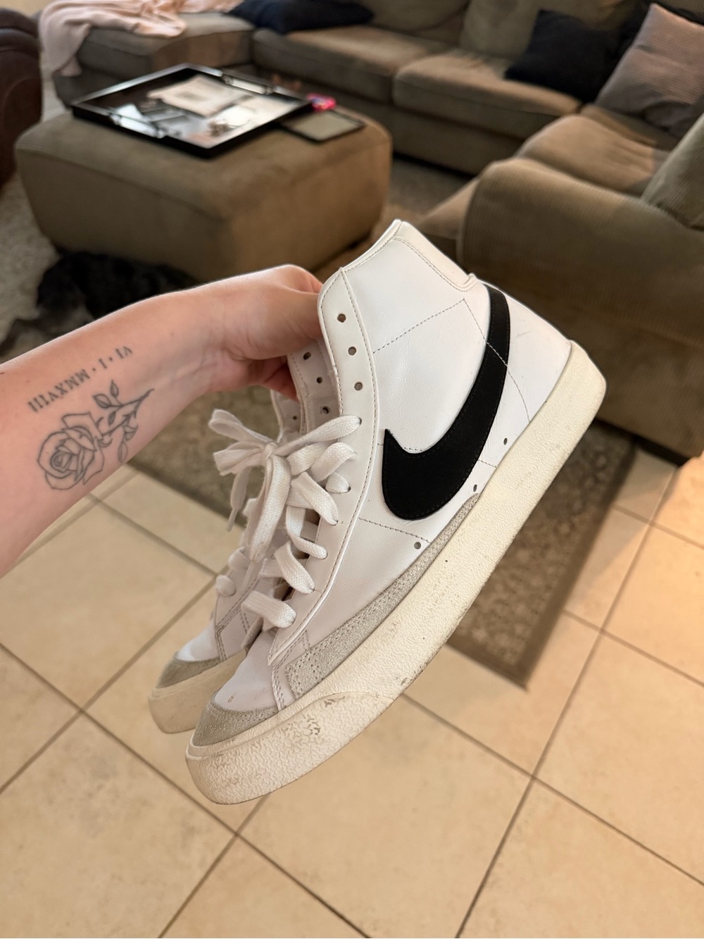 Nike White High-Top Sneakers with Black Swoosh